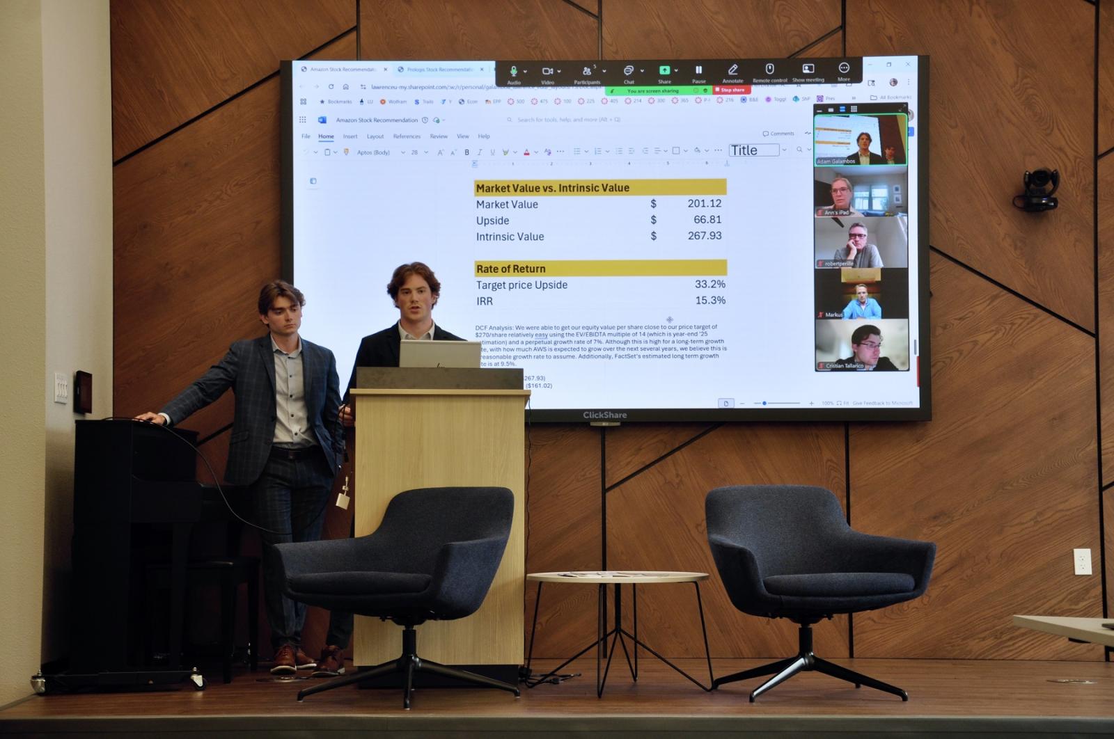 Cody Brekke and Carter Cloutier, both rising juniors, present their investment pitch to a panel of alumni connected remotely.