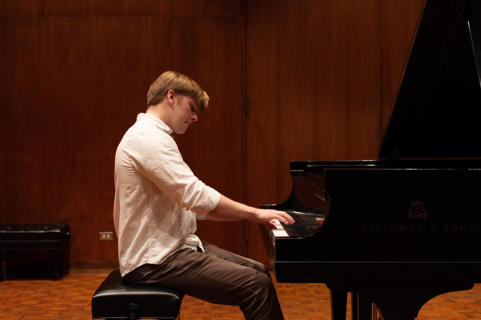 William Surtees plays the piano.