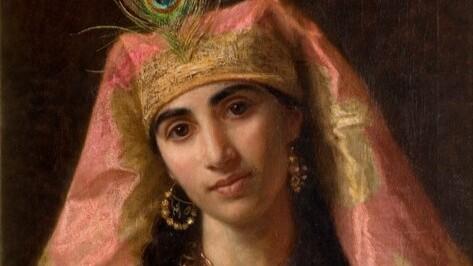 This image is a painting titled Scheherazade by the British artist Sophie Gengembre Anderson (1823–1903). It depicts the legendary Persian queen and storyteller from the collection of Middle Eastern folk tales known as One Thousand and One Nights. 