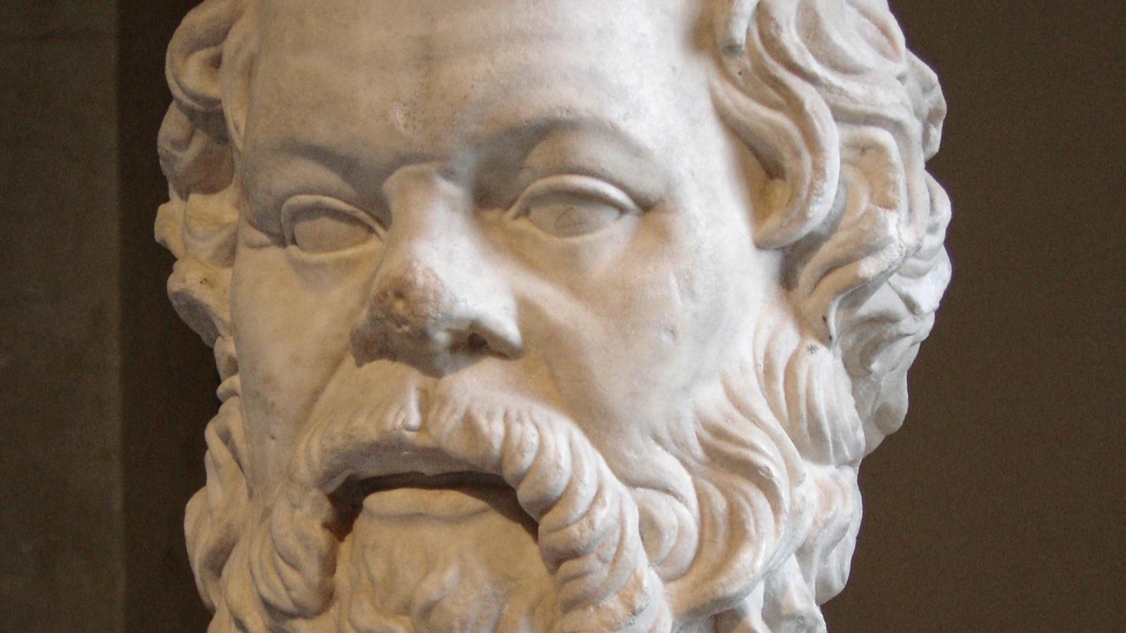 This image is a Roman marble portrait bust of the ancient Greek philosopher Socrates