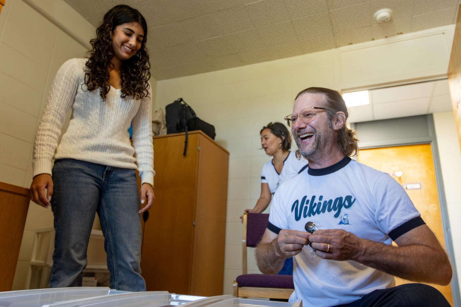 in residential room with parents