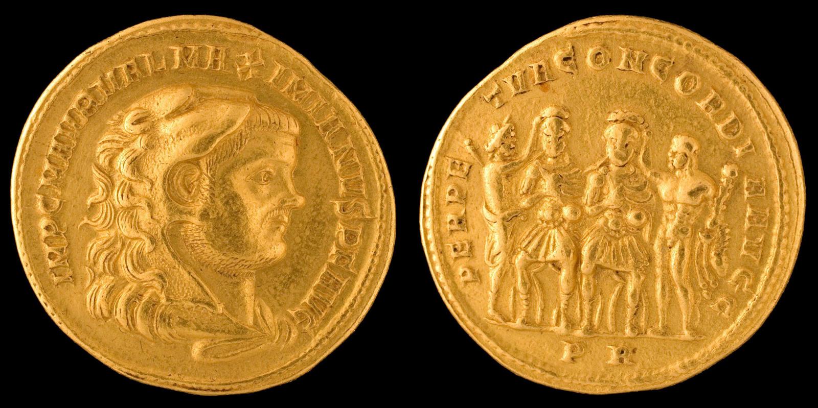 Two views of a gold ancient Roman coin on a black background. The left side shows the obverse with a laurel-crowned imperial bust in profile, surrounded by a circular Latin inscription. The right side shows the reverse with four standing figures in relief, arranged side by side, with additional Latin text around the edge and small lettering near the bottom.