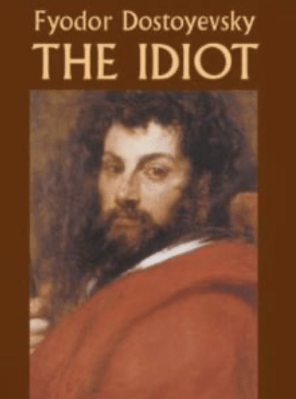 The cover of Fyodor Dostoyevsky's book The Idiot. Beneath the title and author, it shows a painted portrait of a man with a beard and a red coat.