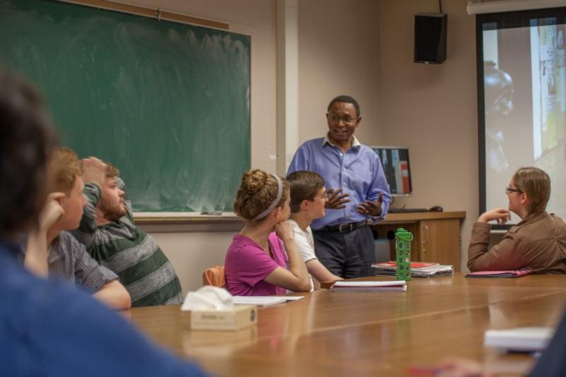 Lifongo Vetinde talks with students in a class at Lawrence.