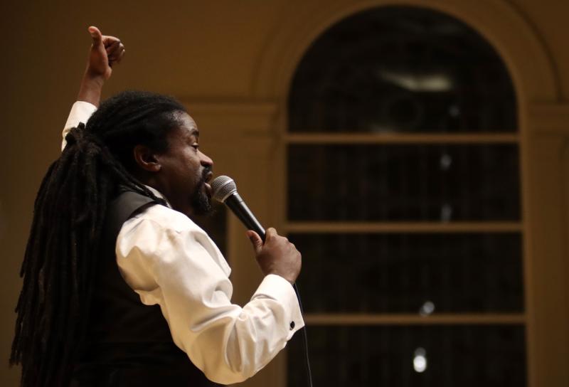 Rev. Sekou leads the audience in song during Monday's MLK Celebration at Memorial Chapel.