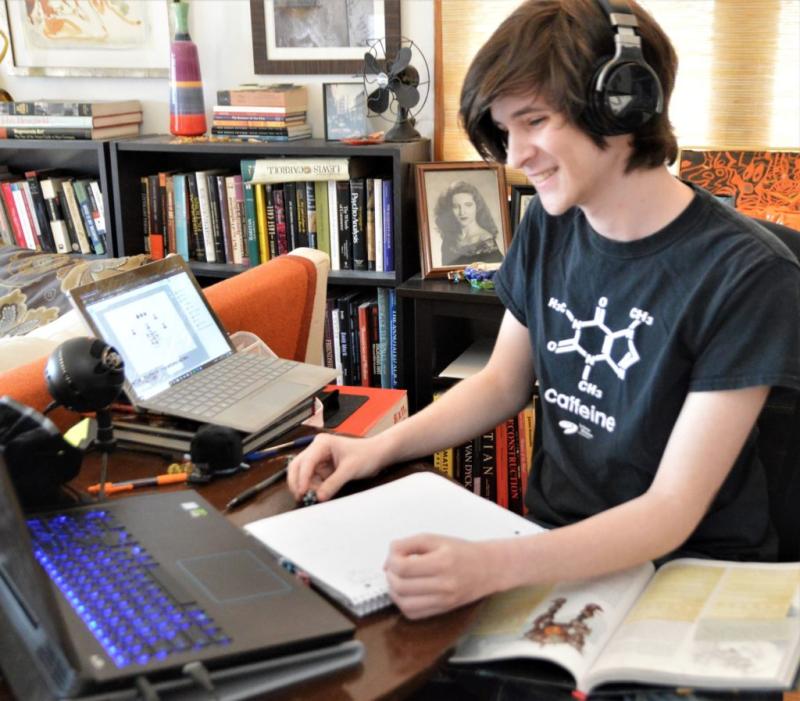 Charles Brailovsky ’23 runs an episode of Blame the Dice with Lawrence classmates on Twitch.
