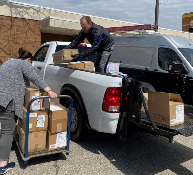 Professors deliver boxes of Lawrence University’s PPE supplies to City of Appleton