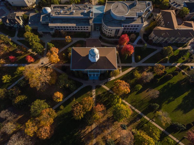 Fall aerial campus view featuring Main Hall
