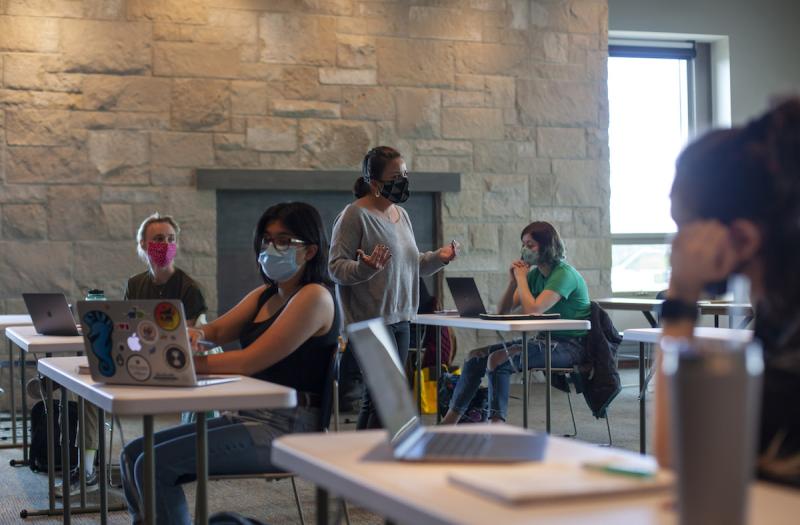 Students receiving class with masks 