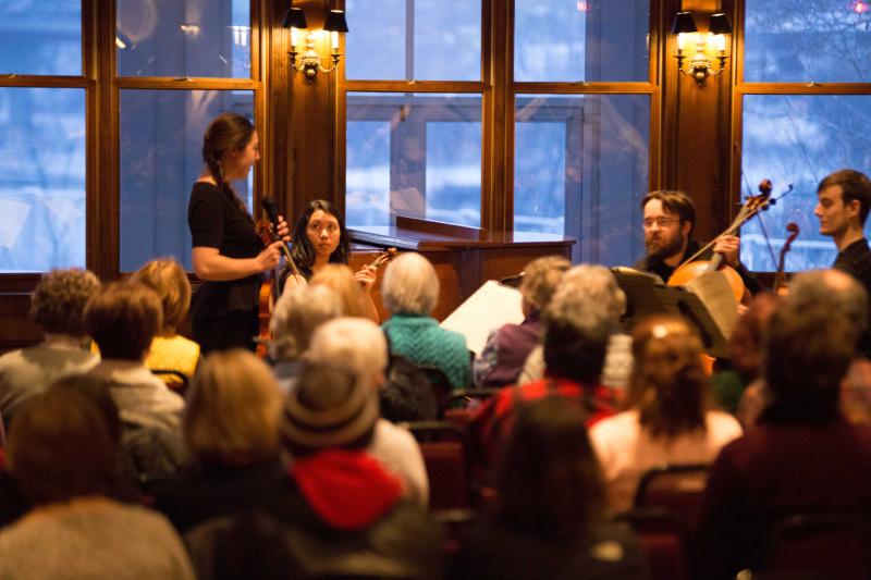 Lawrence musicians perform as an audience looks on at Riverview Gardens.
