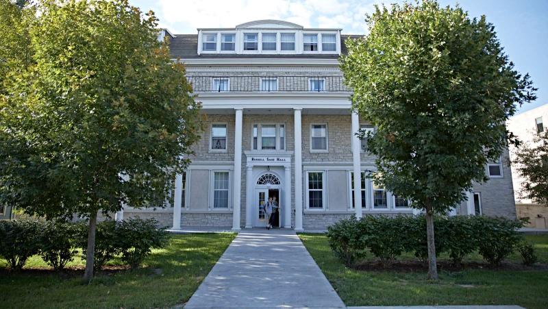 students exiting sage hall