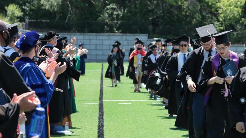 Students line up during Commencement 2021 