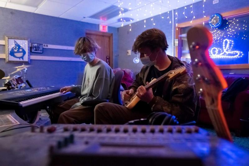Lawrence students Jonah Trudeau and Liam Phillips, members of the band VOODIS, work on a song in SOL Studios.