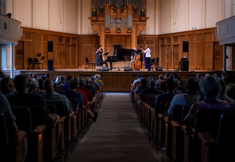 Audience members look on as members of Decoda perform in Memorial Chapel during the 2021 Decoda Chamber Music Festival.