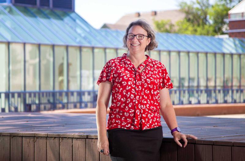 Danielle Joyner poses for a photo outside the Wriston Art Center. 