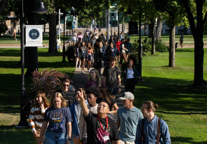 First-year students walk across campus.