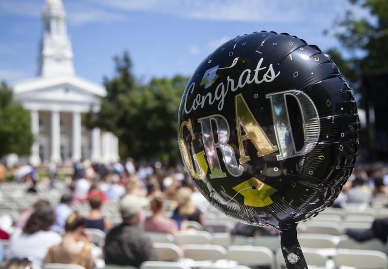Congrats Grad balloon is seen at commencement on Main Hall Green.