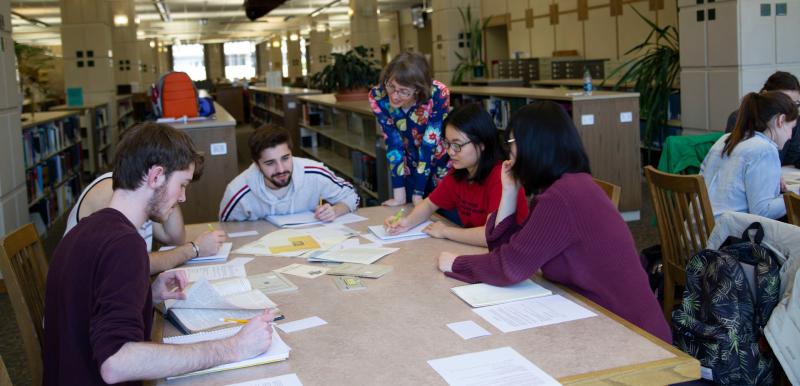 Students working at table in Library