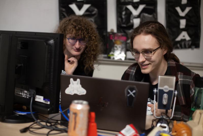 Willow Higgins and Nick Mayerson run the livestream during the Great Midwest Trivia Contest .