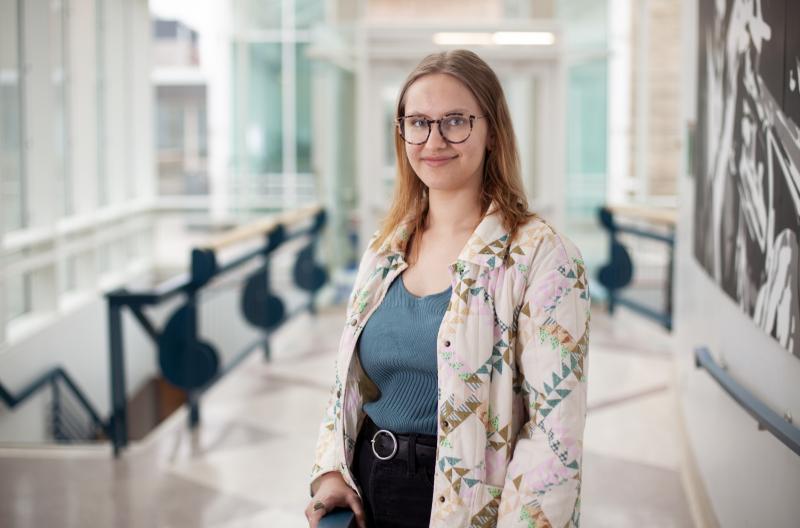 Emily Dorr poses for a portrait in the entryway of the Music-Drama Center.