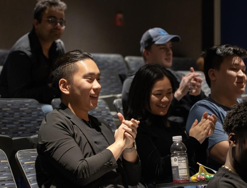 Alec Nguyen, a senior claps his hands after being announced as the first place finisher in Launch LU.