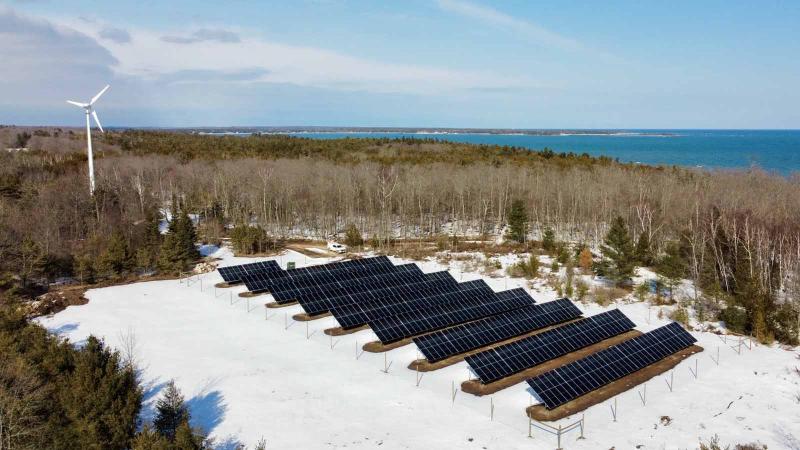 Bjorklunden Aerial of Grounds with windmill and solar panel array