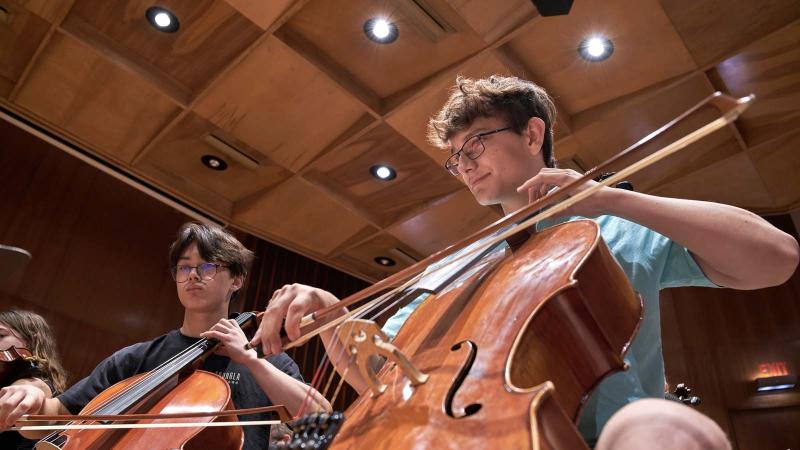 LSMI cellists playing in Harper Hall