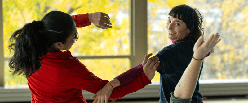 A group of people dancing.