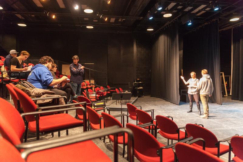 A group of people in a theater