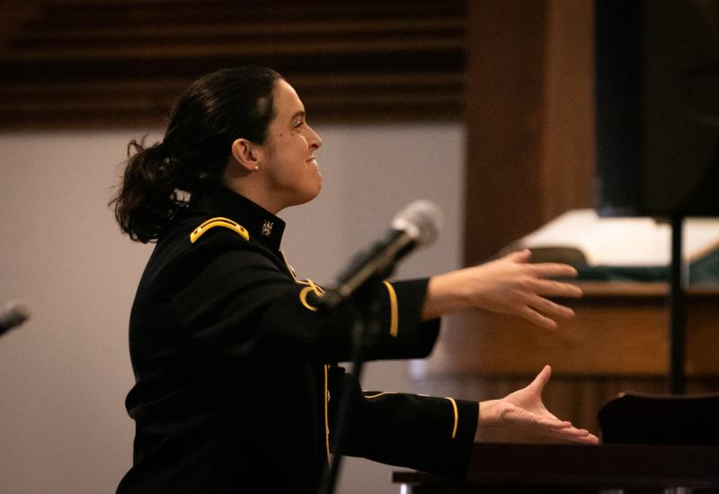 Bonnie Alger leads the U.S. Army Chorus in a performance last fall.