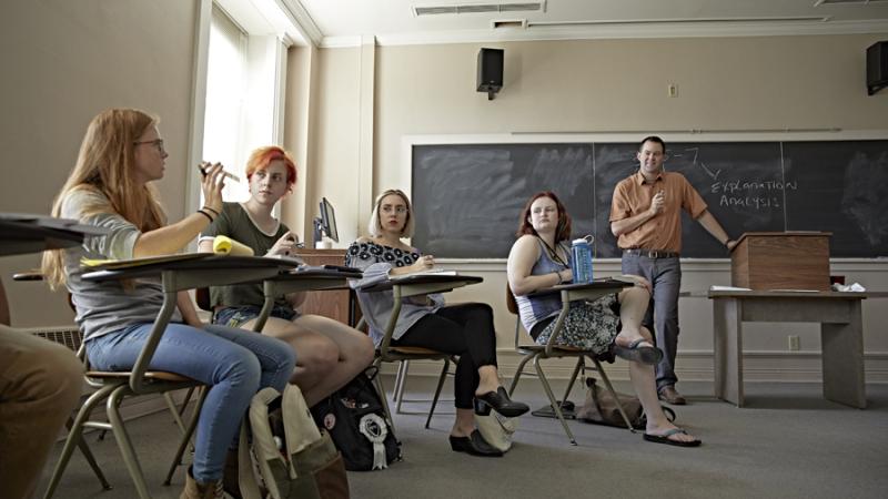 David McGlynn teaching students in English class.