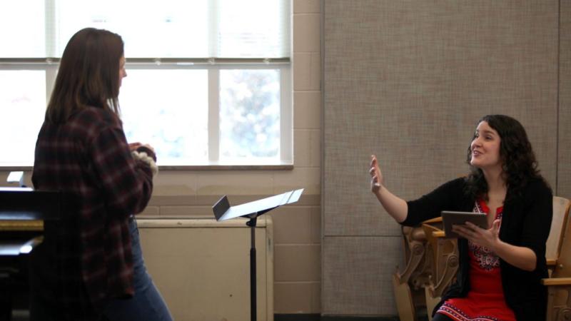 Holly Beemer '22 listens as music professor Estelí Gomez, seated to her right, gives feedback during a studio voice class in the Music-Drama Center. 