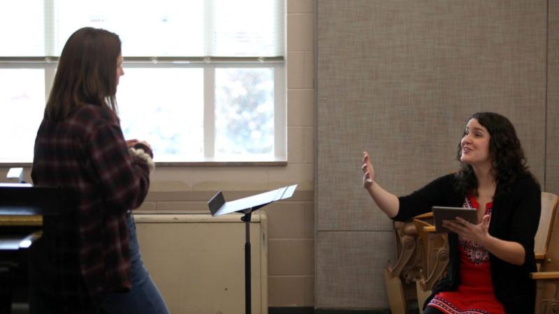Holly Beemer '22 listens as music professor Estelí Gomez, seated to her right, gives feedback during a studio voice class in the Music-Drama Center.