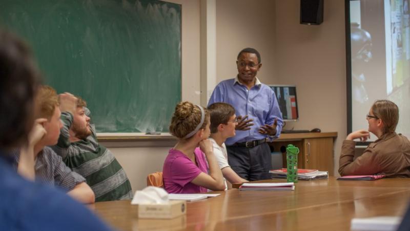 Lifongo Vetinde talks with students in a class at Lawrence.