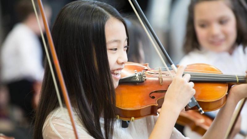 The Academy of Music student playing violin