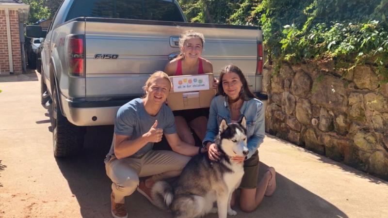 From left: Nick Felan ’19, Madeleine Felan, and Lizzy Garcia Creighton ’19 started a nonprofit in Dallas called All in for Children.