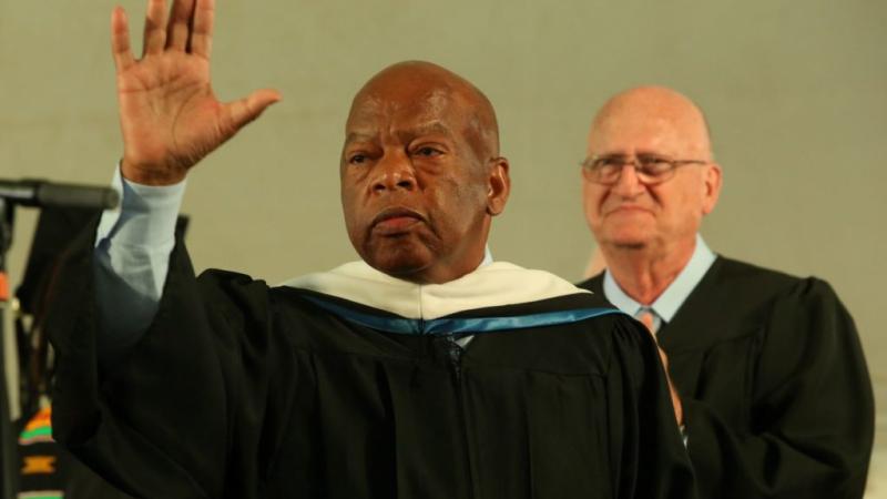 Rep. John Lewis greets graduates and their families as the 2015 Commencement speaker at Lawrence University.