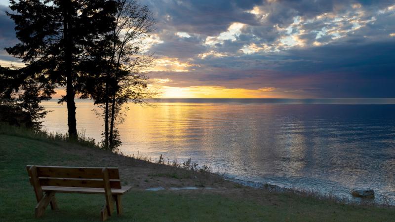 Bjorklunden bench overlooking Lake Michigan shoreline by Rob Kopecky