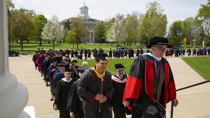faculty and staff march into Memorial Chapel for a spring convocation