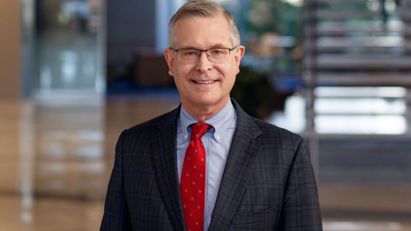 Headshot of Dr. John Raymond