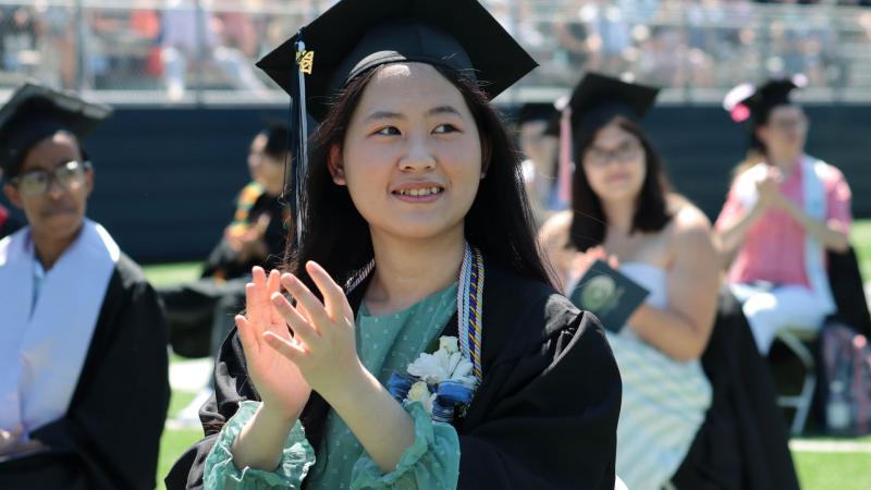 Graduate at Commencement ceremony at Banta Bowl June 2021