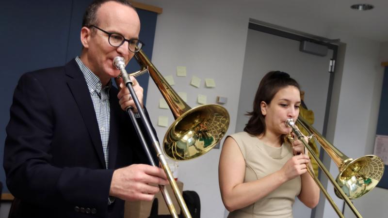 Tim Albright, assistant professor of music works with Allie Goldman ’21 during a trombone teaching session in Shattuck Hall