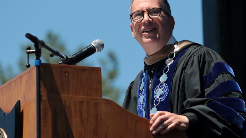 Mark Burstein in the podium during Commencement 
