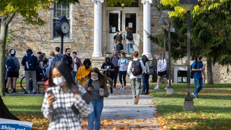 Students walking in and out of Memorial Hall as classes changes.