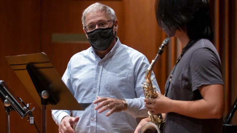 Steven Jordheim, Professor of Music, works with Gabe Reyes, a sophomore, during Saxophone Studio.