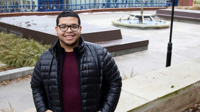 Papo Morales poses for a photo near the Wriston Art Center.