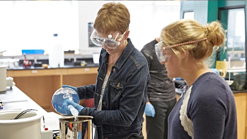 Students working in a science lab.