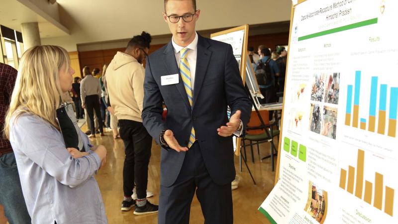 Student presents research project at BioFest