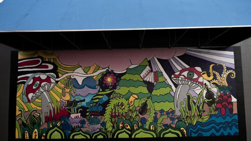 mural with greenery, land, and vegetation growing