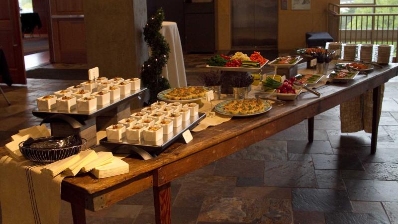 Table filled with snacks and hor devours